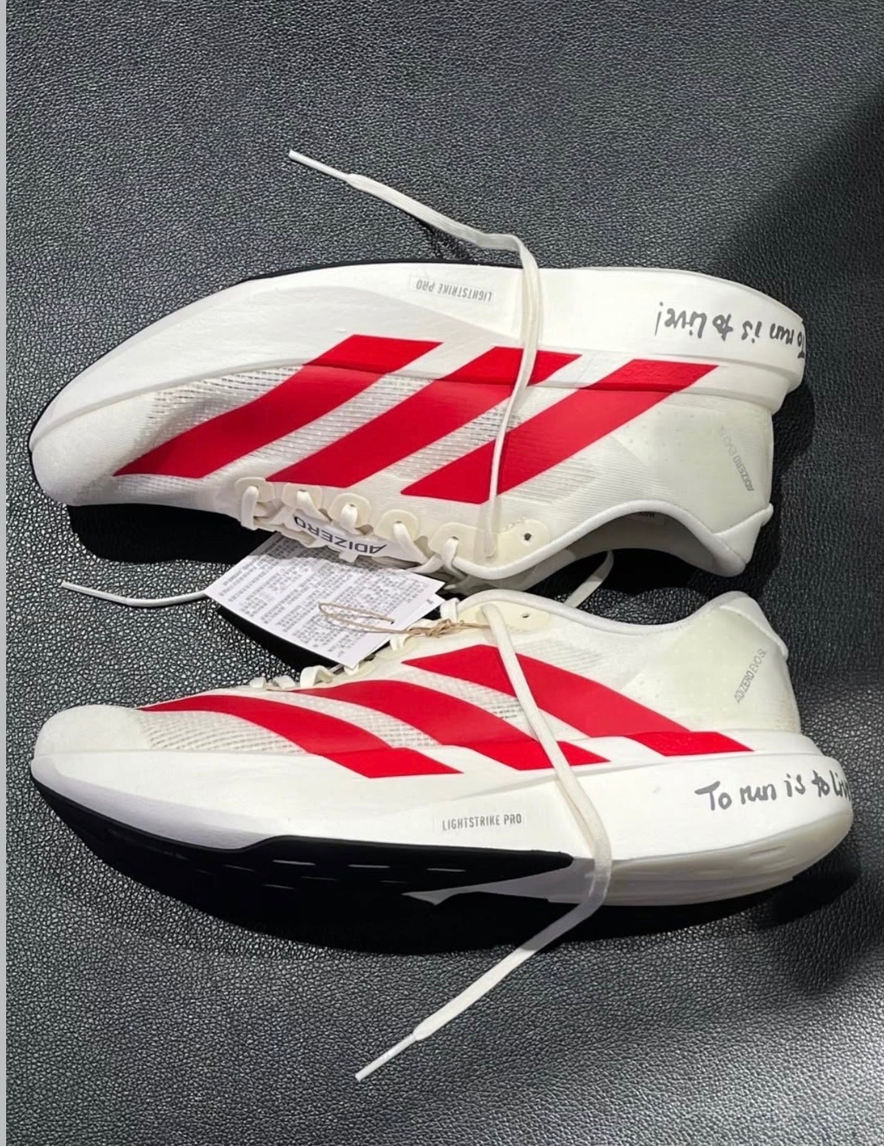 ADIDAS ADIZERO EVO SL BEIGE ROJO