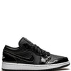 JORDAN RETRO 1 LOW CHAROL NEGRO / BLANCO